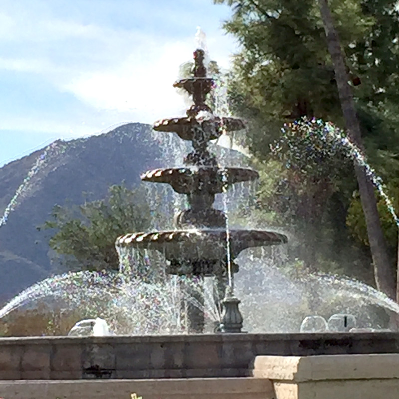 Cast stone fountain with pool